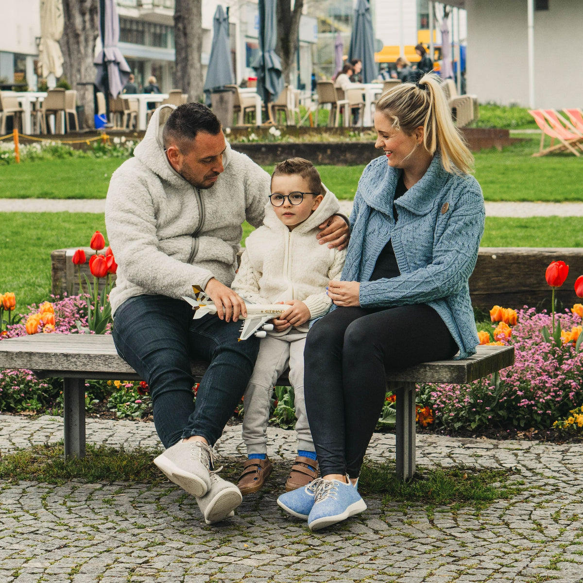 Damulltröja i merinoull med knapp ljusblå