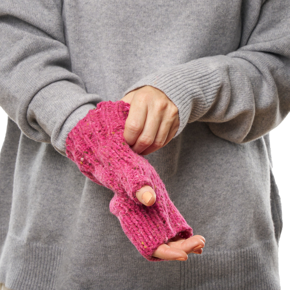 Stickade fingerlösa ullhandskar melerade rosa