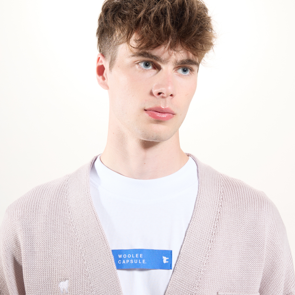 Merinoullkofta Woolie Capsule beige