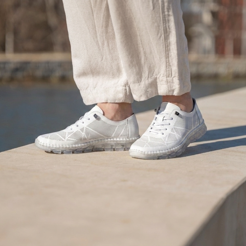 Damfritidslädersneakers vit