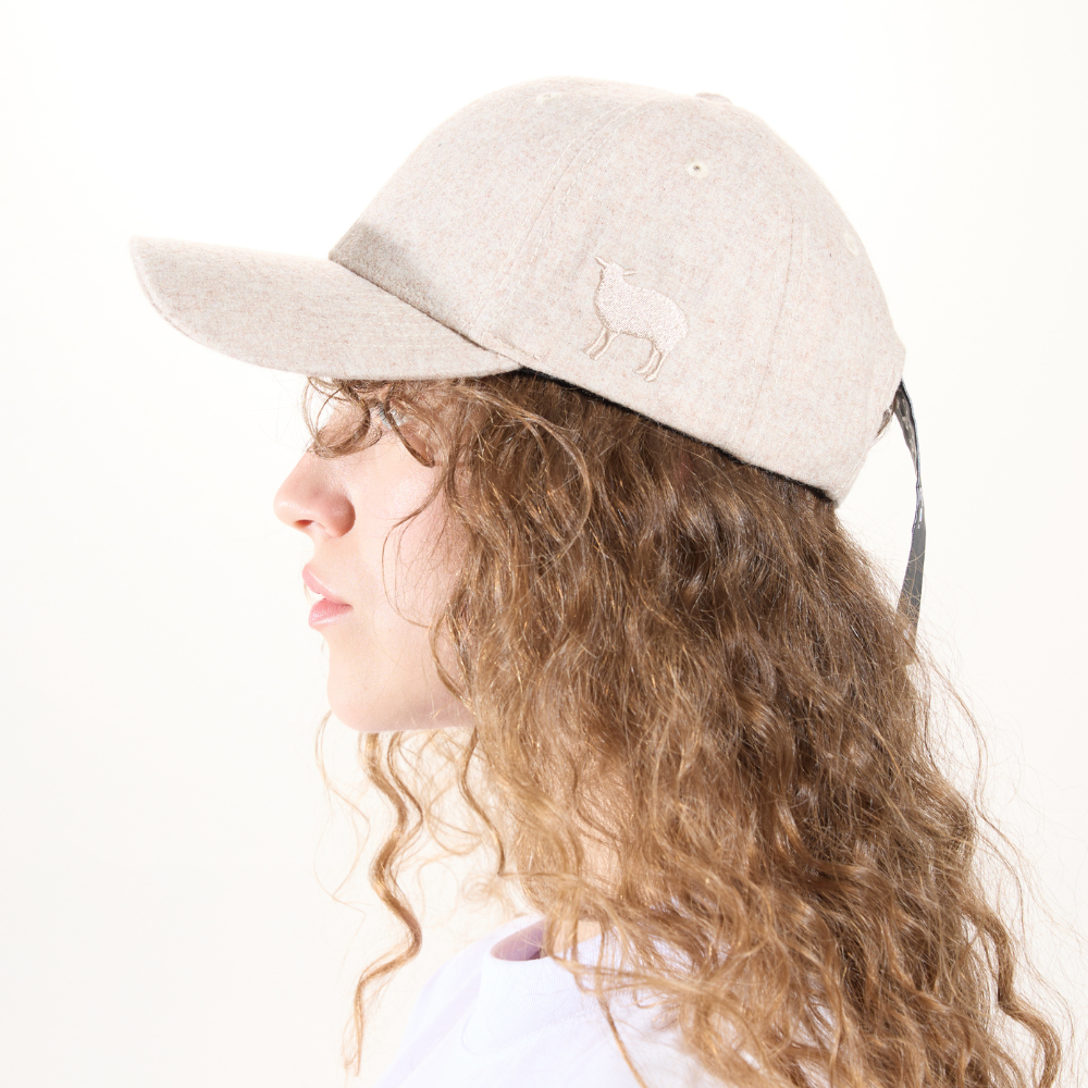 Ullkeps merinoull Woolie Capsule beige/svart