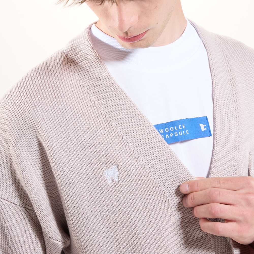 Merinoullkofta Woolie Capsule beige