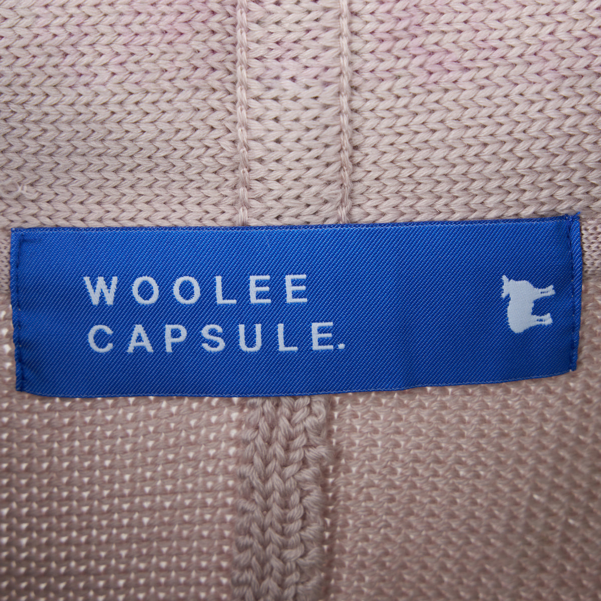 Merinoullkofta Woolie Capsule beige